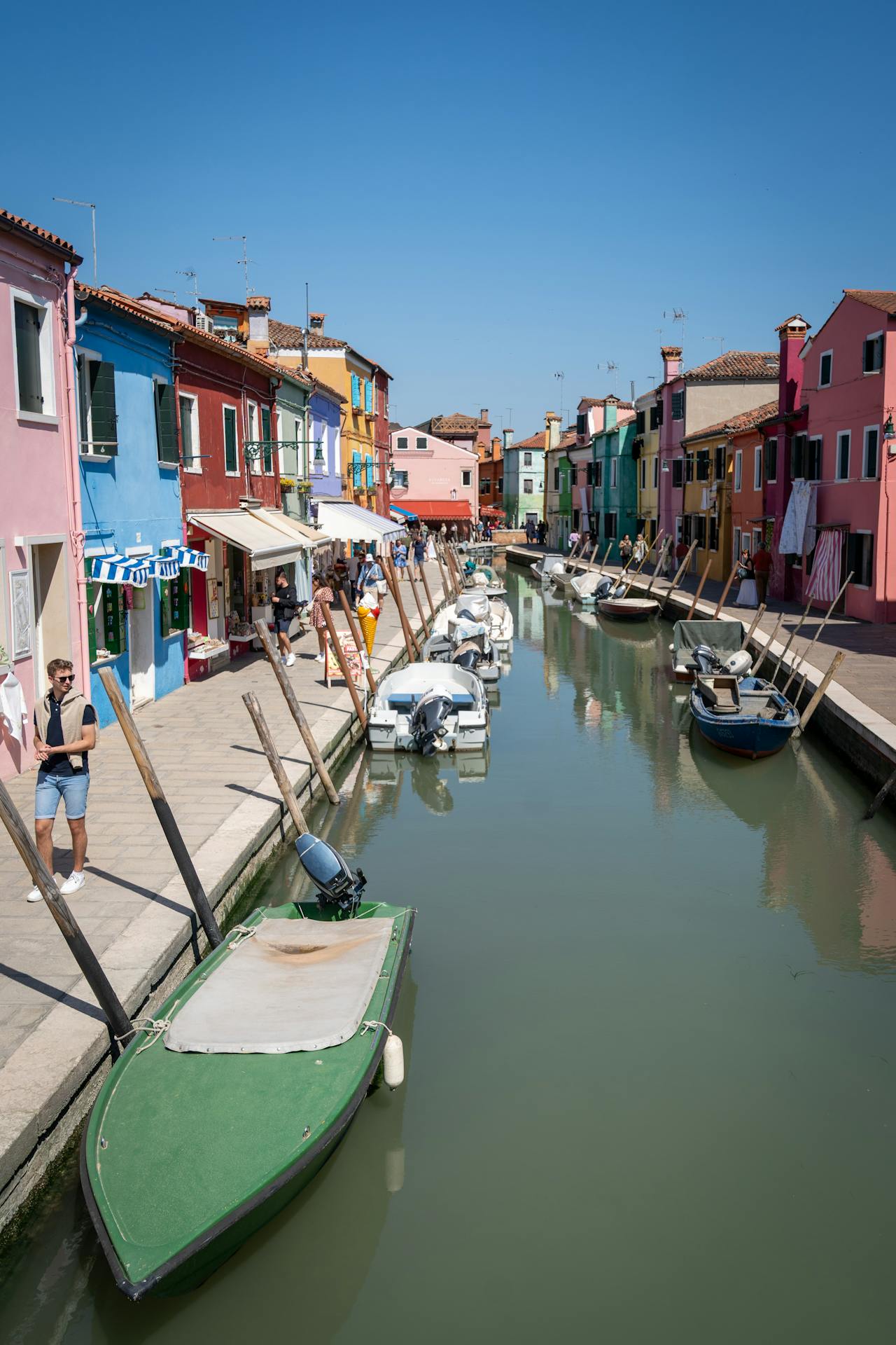 Input image for WAN 2.7 image-to-video test: colorful canal scene